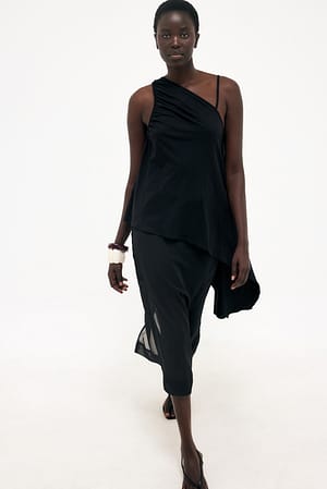 Black Asymmetrische jersey top