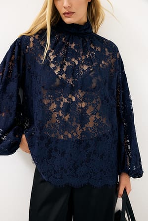 Navy Spitzenbluse mit Ballonärmeln