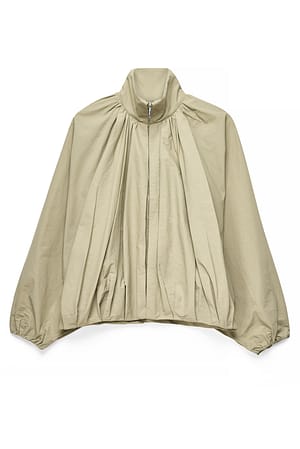 Beige Veste à manches chauve-souris