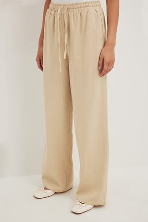 ELASTICATED KNIT TROUSERS