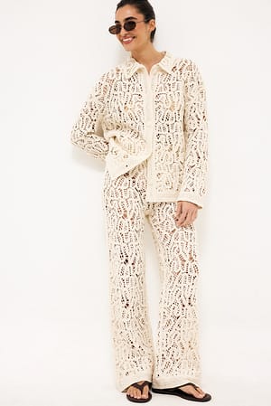 Cream gehäkelte Strickhose