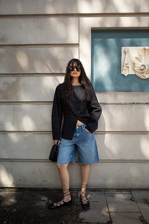 Light Blue Low Waist Loose Raw Hem Denim Shorts