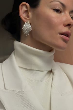 White Witte clusteroorbellen met kralen