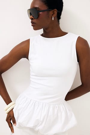 White Peplum Top