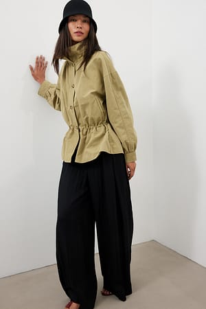 Beige Peplum trenchcoat