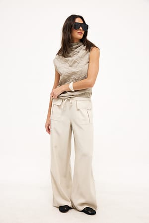 Beige Relaxte broek met grote zak