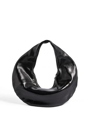 Leather Black Sac rond en cuir verni