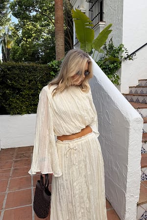 Offwhite Blus med volym och textur
