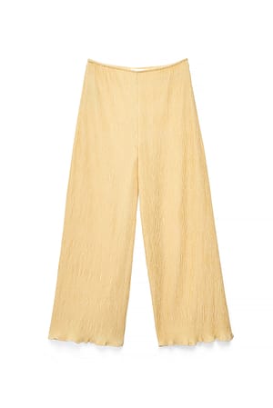 Light Yellow Strukturerade byxor med mellanhög midja