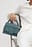 Crossbodytas met gespdetail