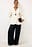 Blazer con escote en V ajustado y mangas voluminosas