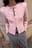 Strickjacke mit Schulterpolstern