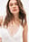 Body con inserciones de encaje