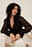 Knitterbluse mit gesmockter Taille