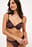 Skinnende bikinioverdel
