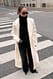 Offwhite Strickpullover mit Rollkragen aus Wollmischung