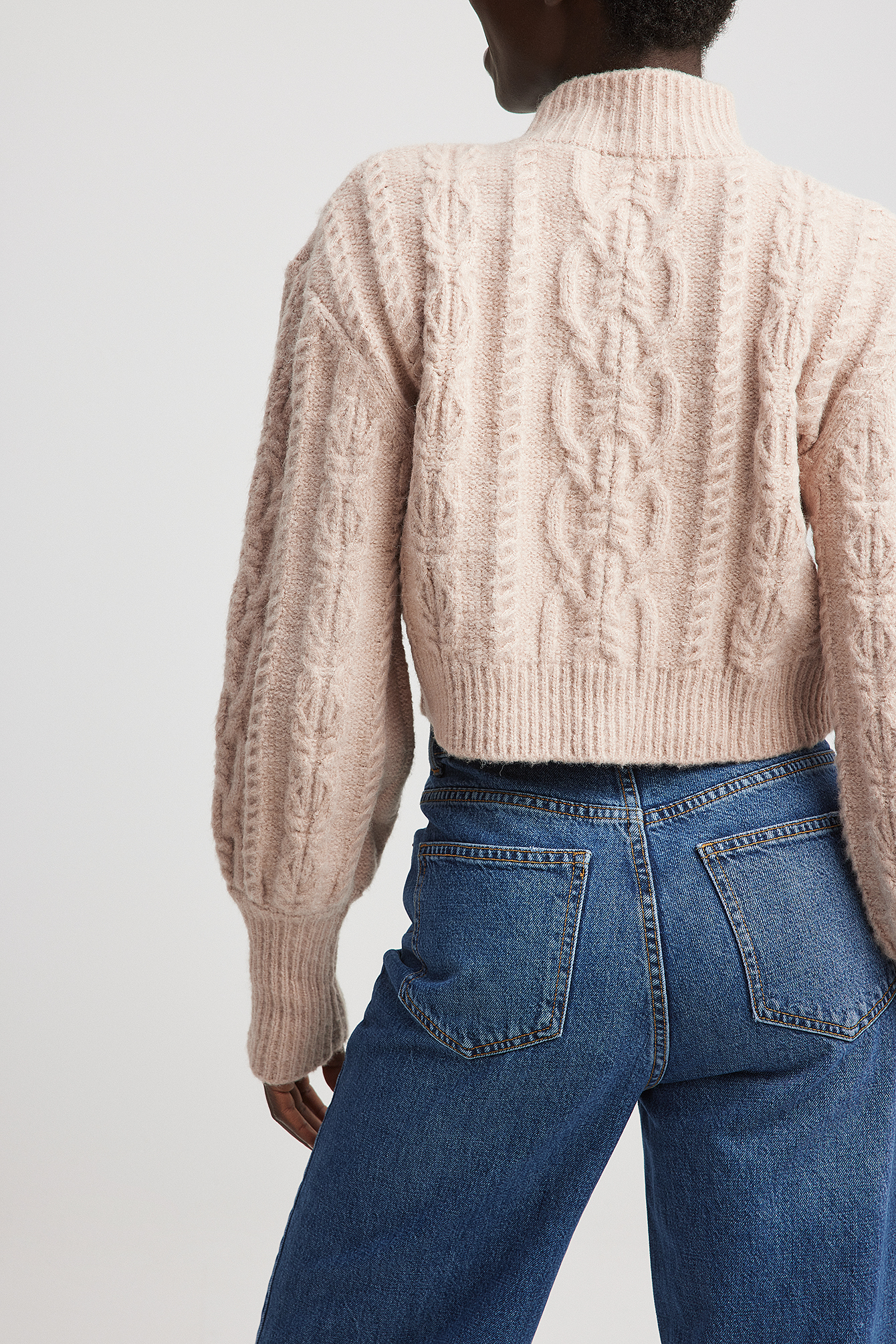 Short cable knit sweater