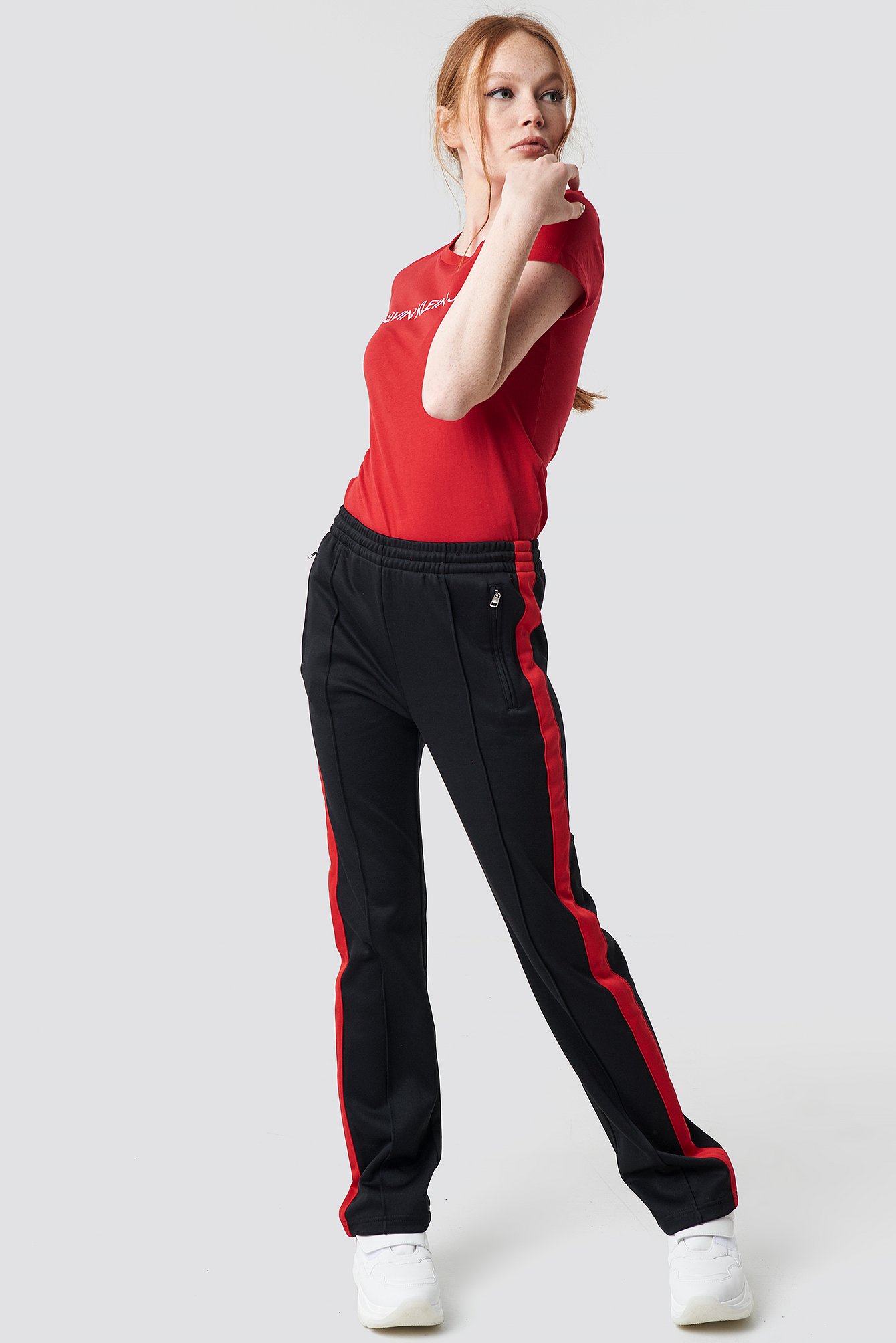 These tracksuit trousers by Calvin Klein feature a high elastic waist, side pockets, a seam detail down the front, a straight leg and a soft material.