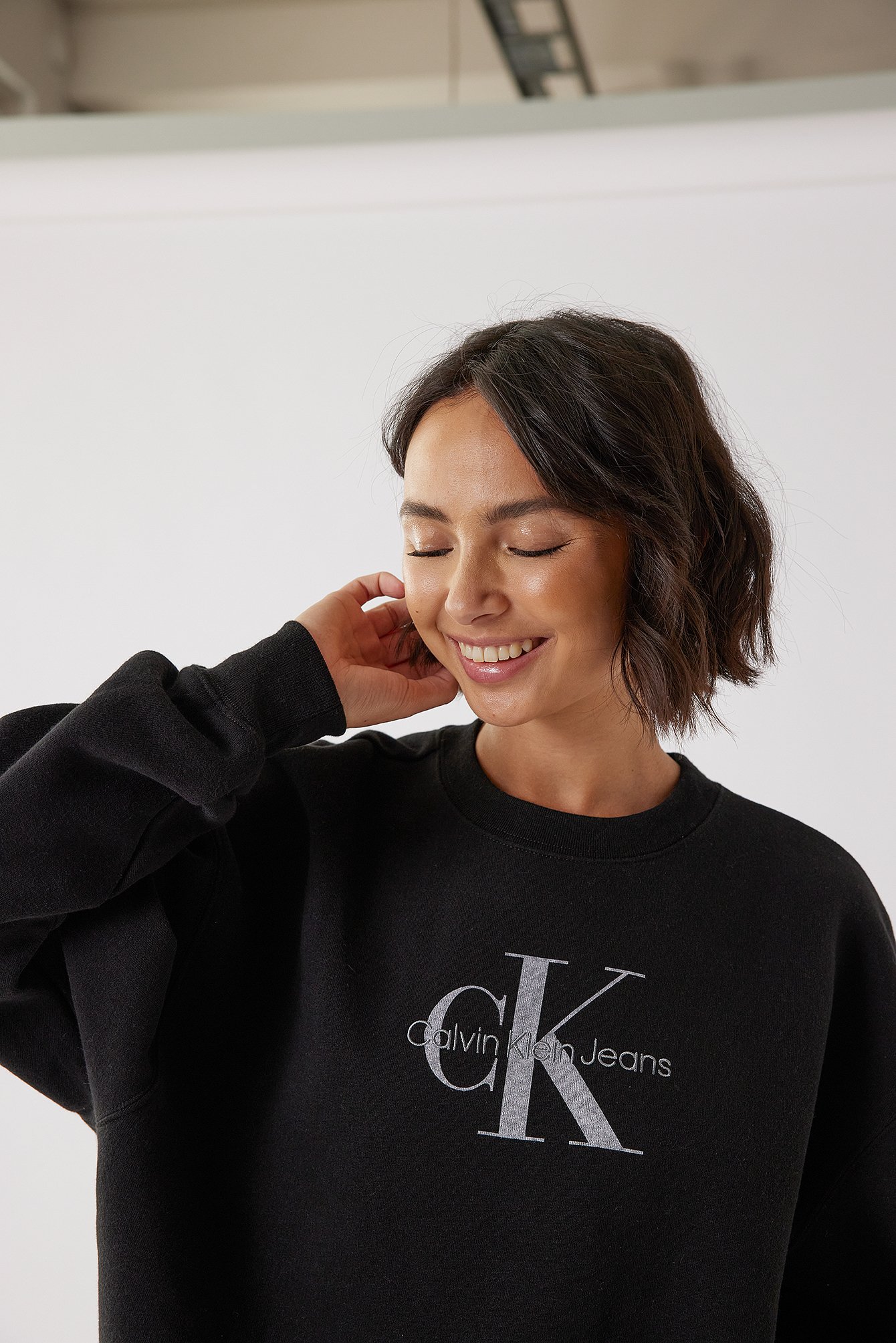 NA-KD Baumwolle Calvin Klein for Organisch oversize Pullover mit rundem Kragen in Schwarz Damen Bekleidung Pullover und Strickwaren Pullover 