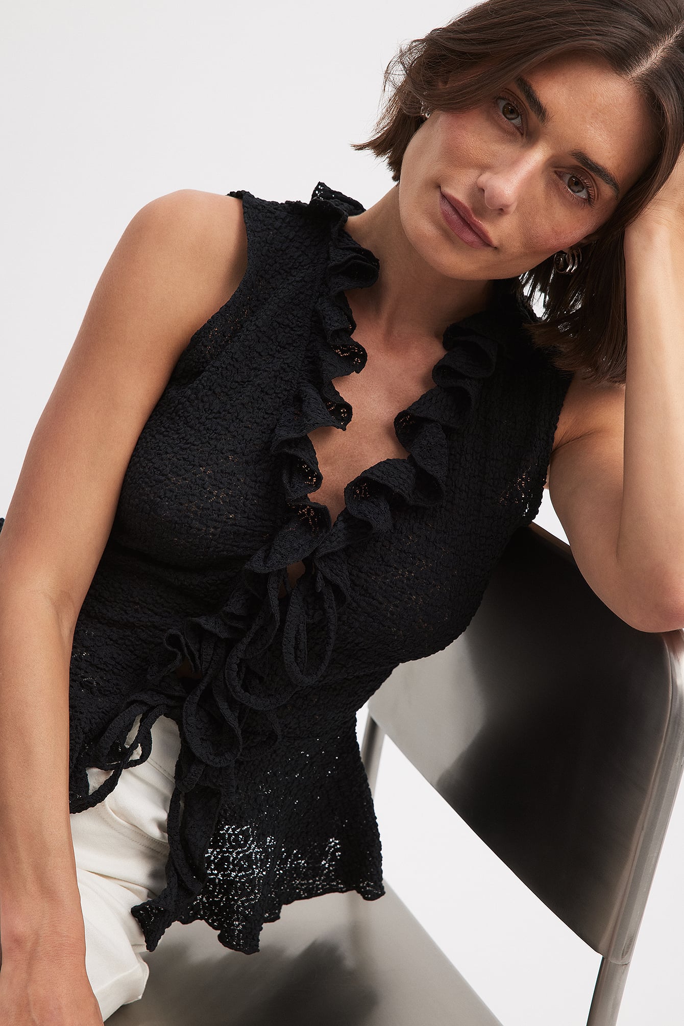 Flounce sleeveless top