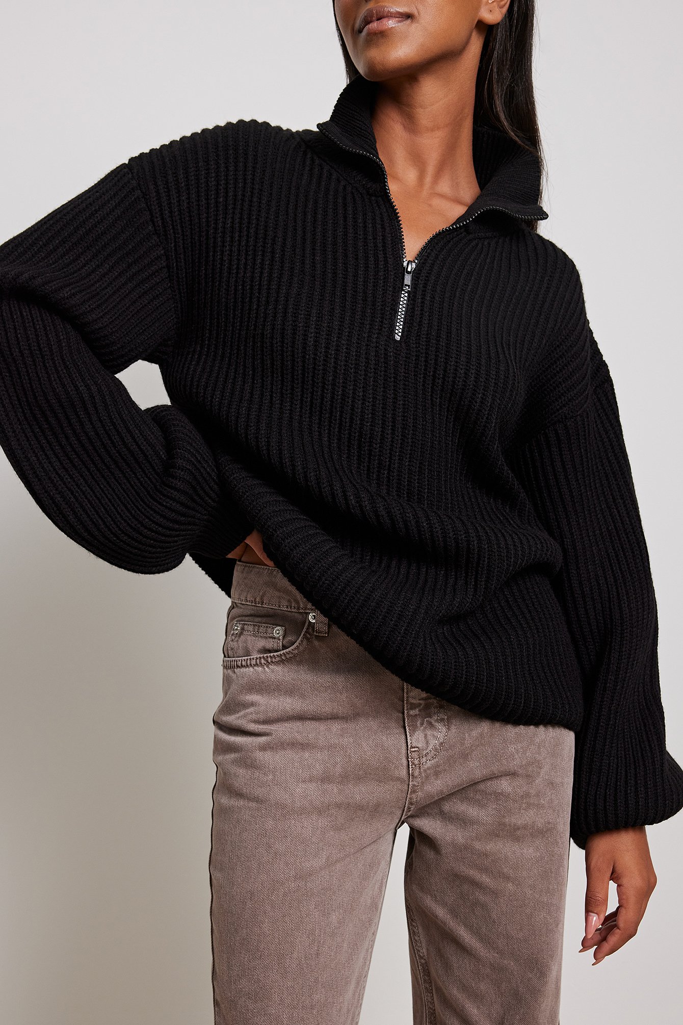 high neck zipped knitted sweater