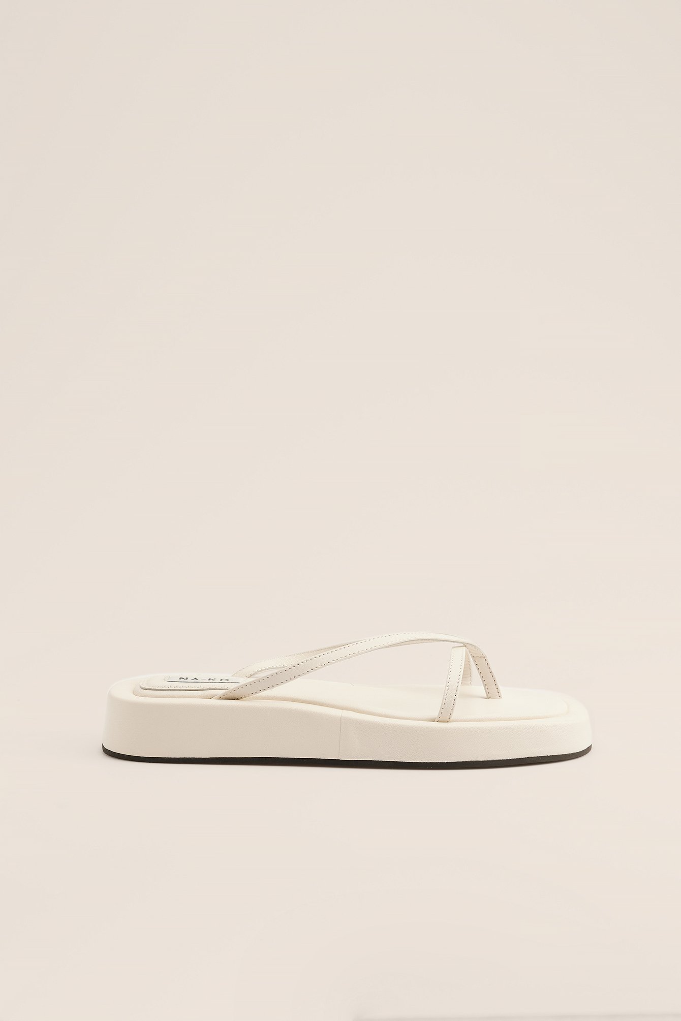 white slip on flip flops