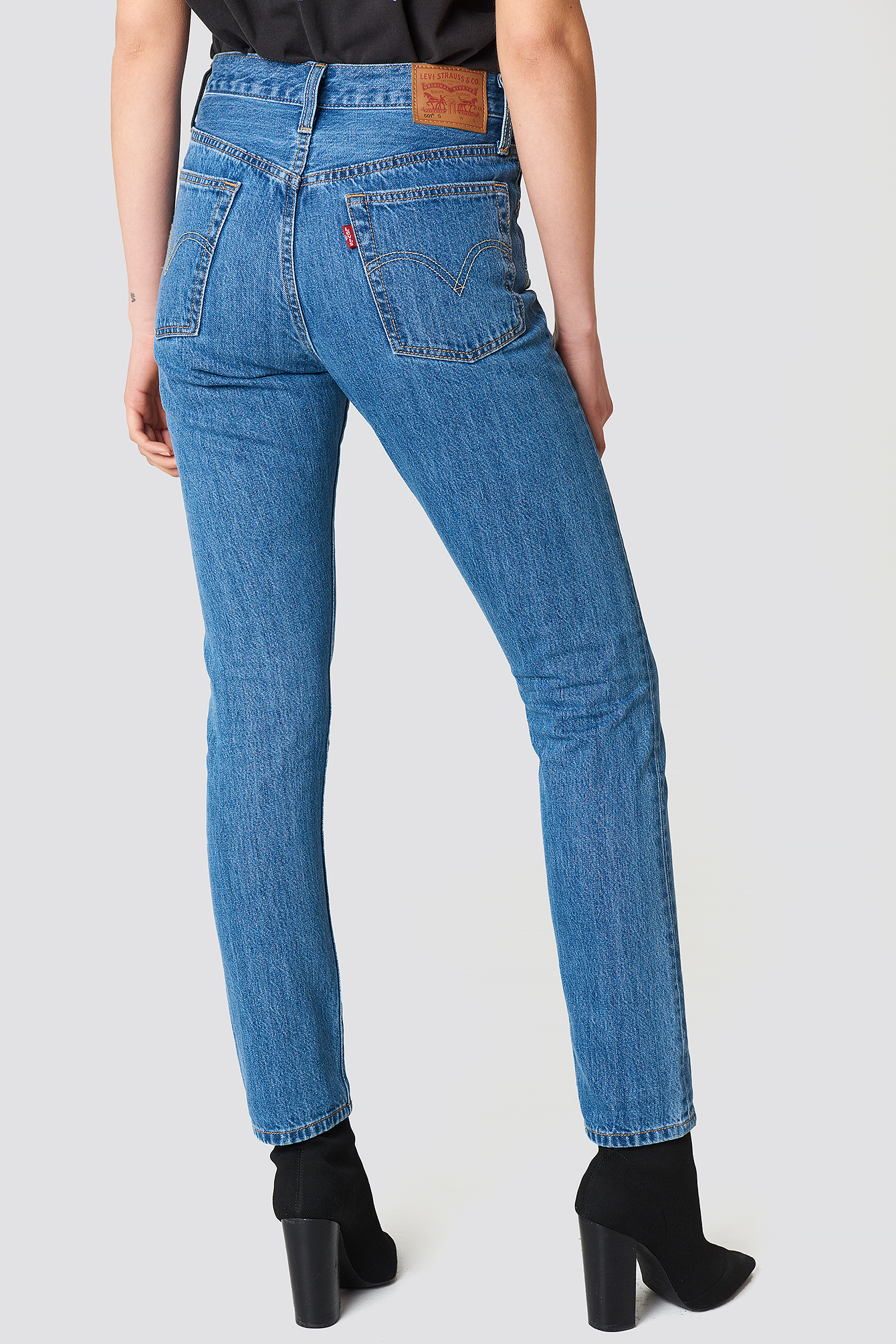 501 skinny rolling dice jeans