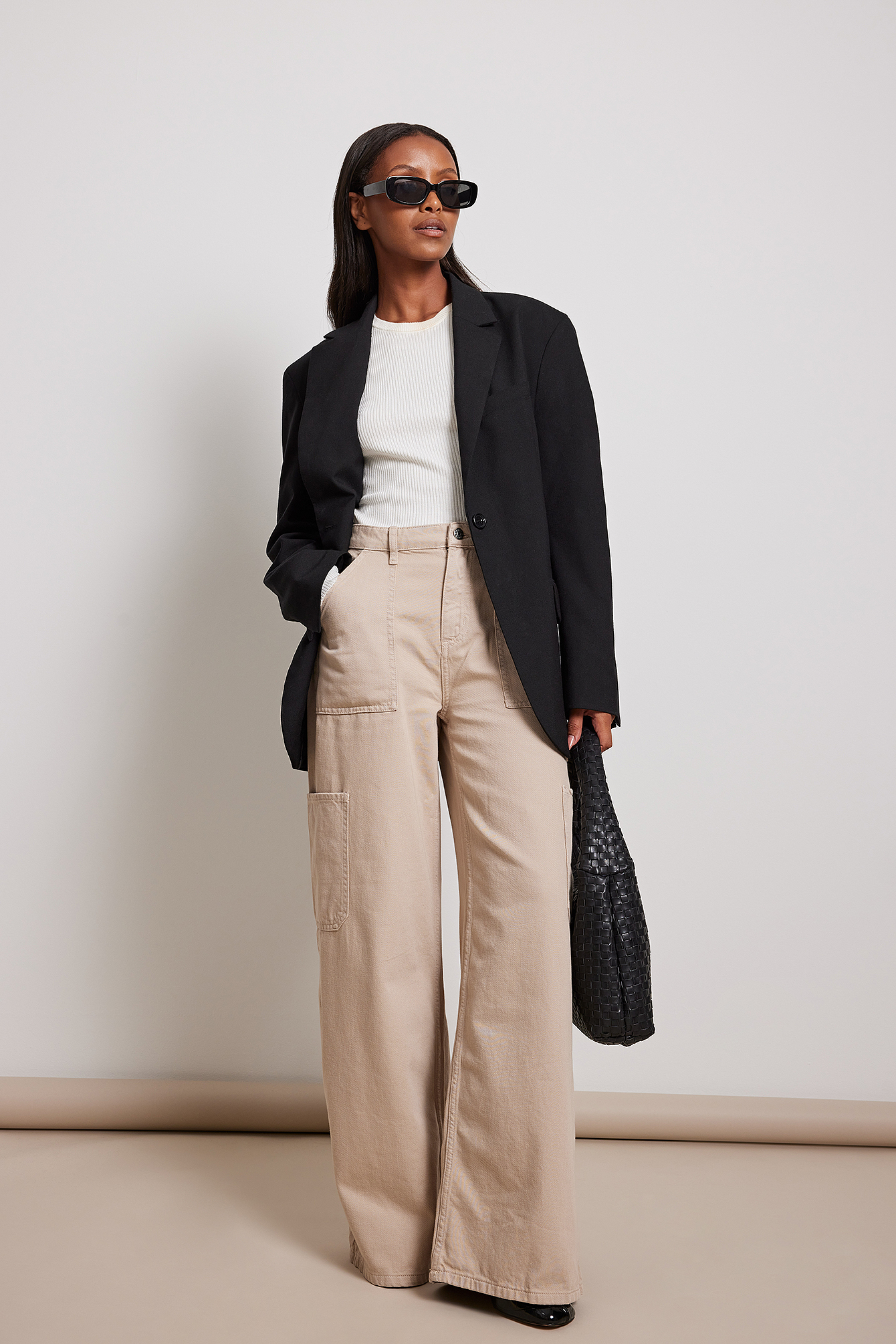 mock neck top with belted cargo pants