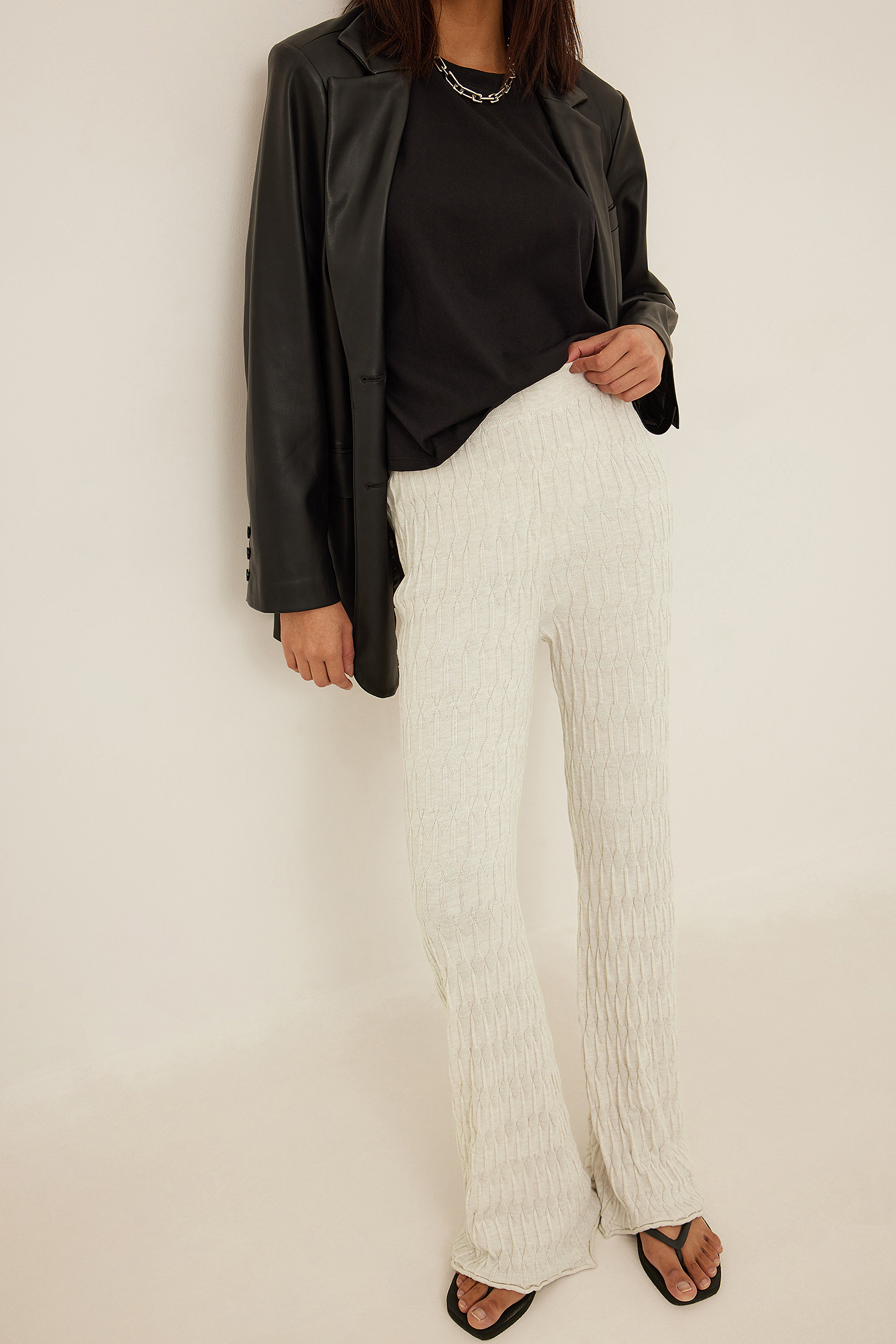 Pantaloni ampi in maglia con motivi Bianco sporco | na-kd.com
