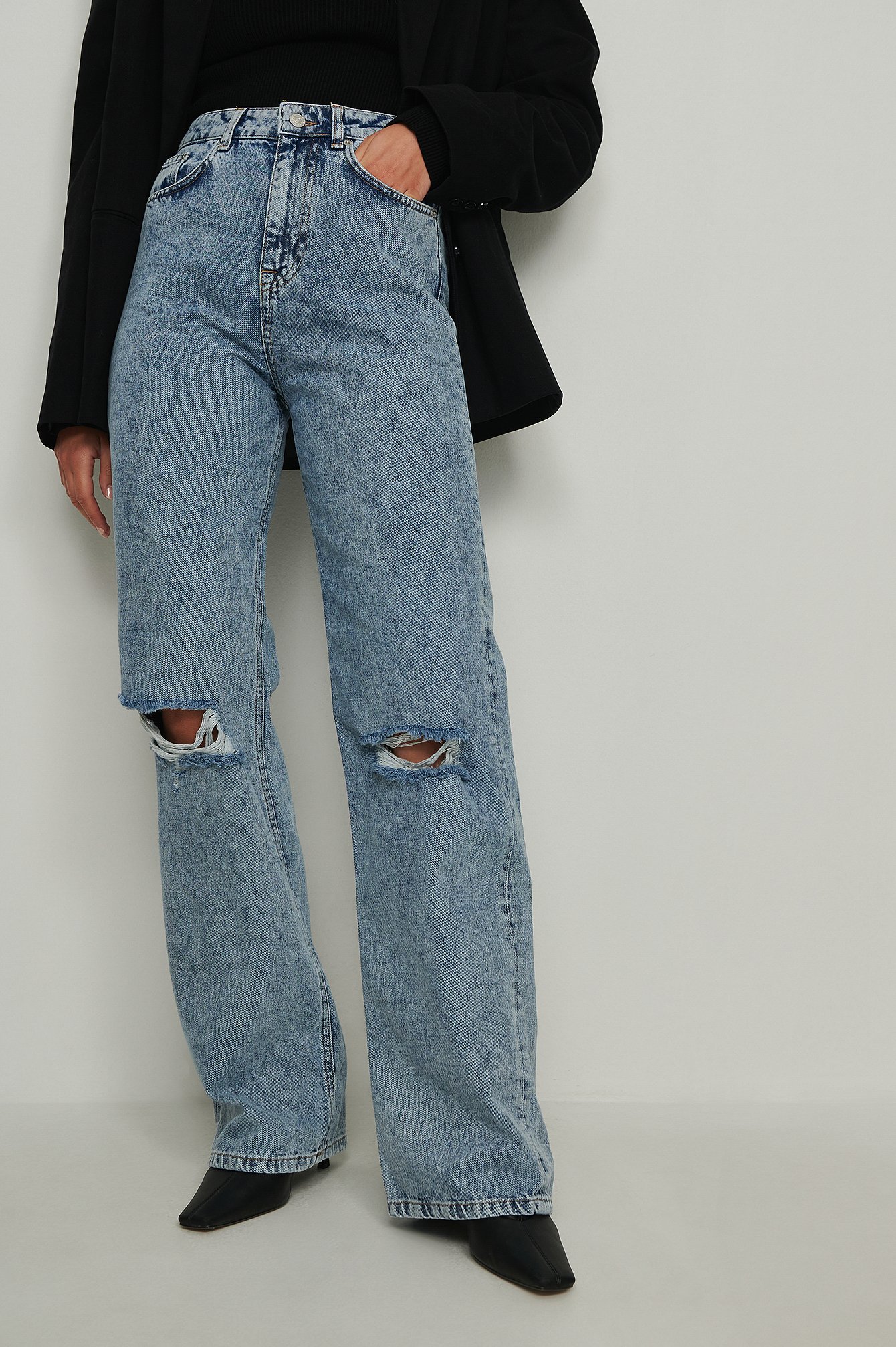 Acid Blue Jeans mit weiten Beinen im Acid-Wash- und Destroyed-Look