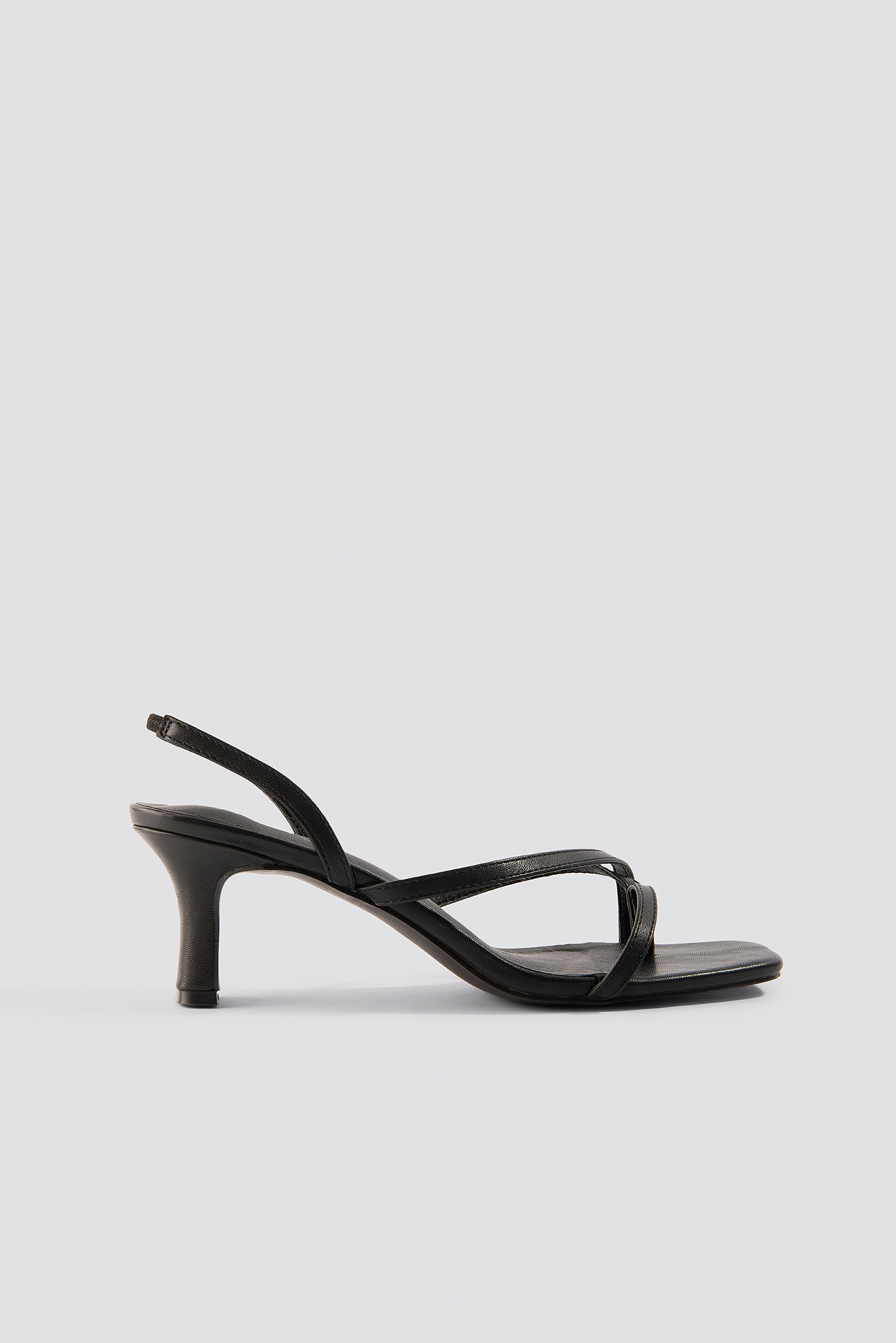 heeled mules with asymmetrical straps