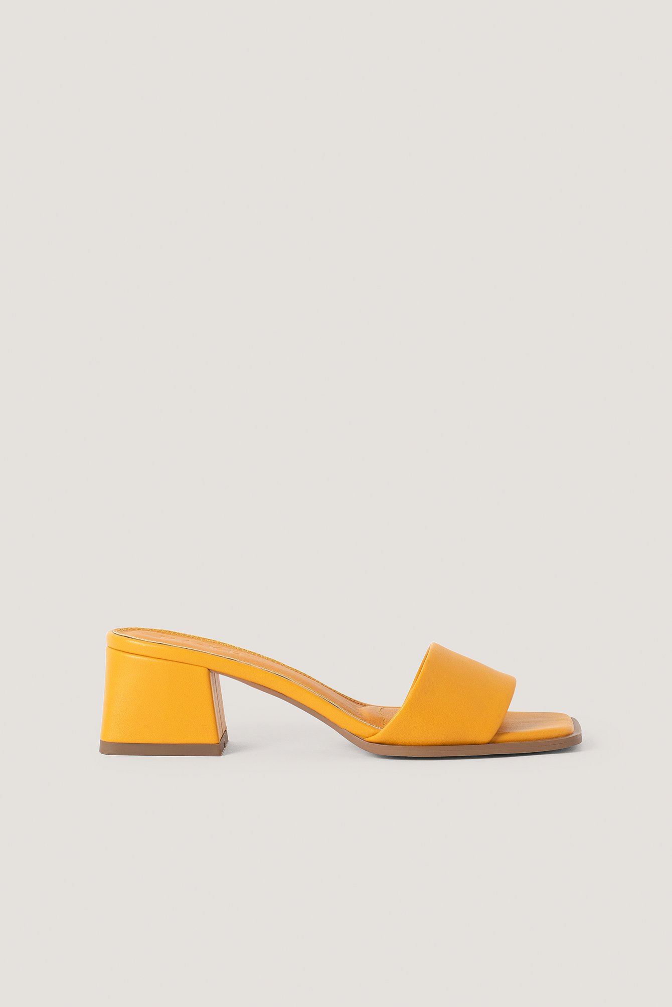 orange heeled mules