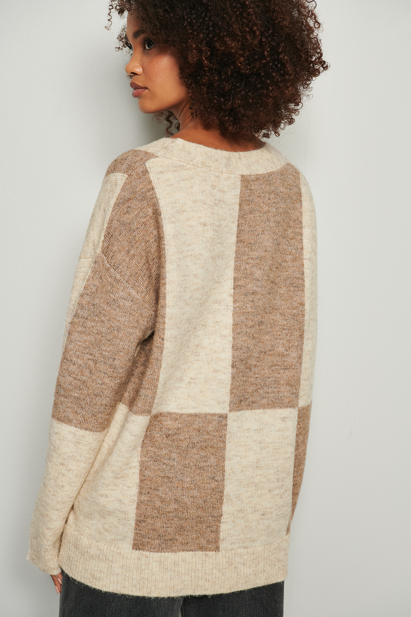 beige colour cardigan