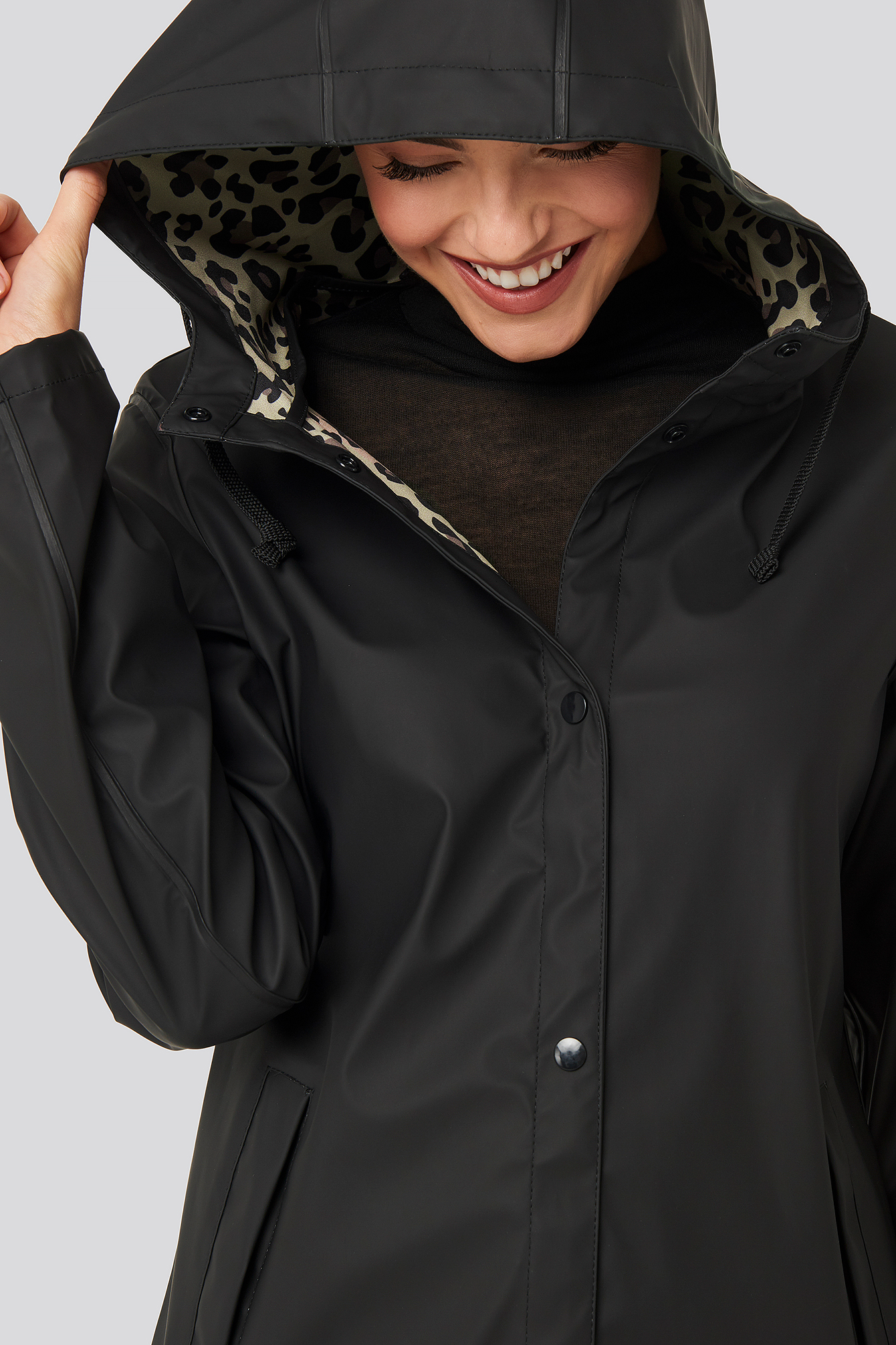 Bonded Leo Rain Coat Black