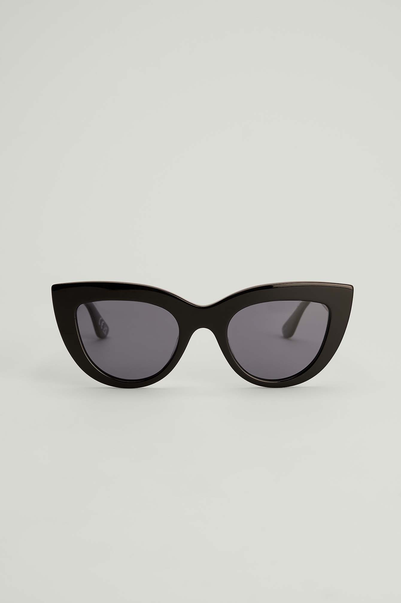 Occhiali da sole con montatura spessa e lenti cat-eye in acetato Nero |  na-kd.com