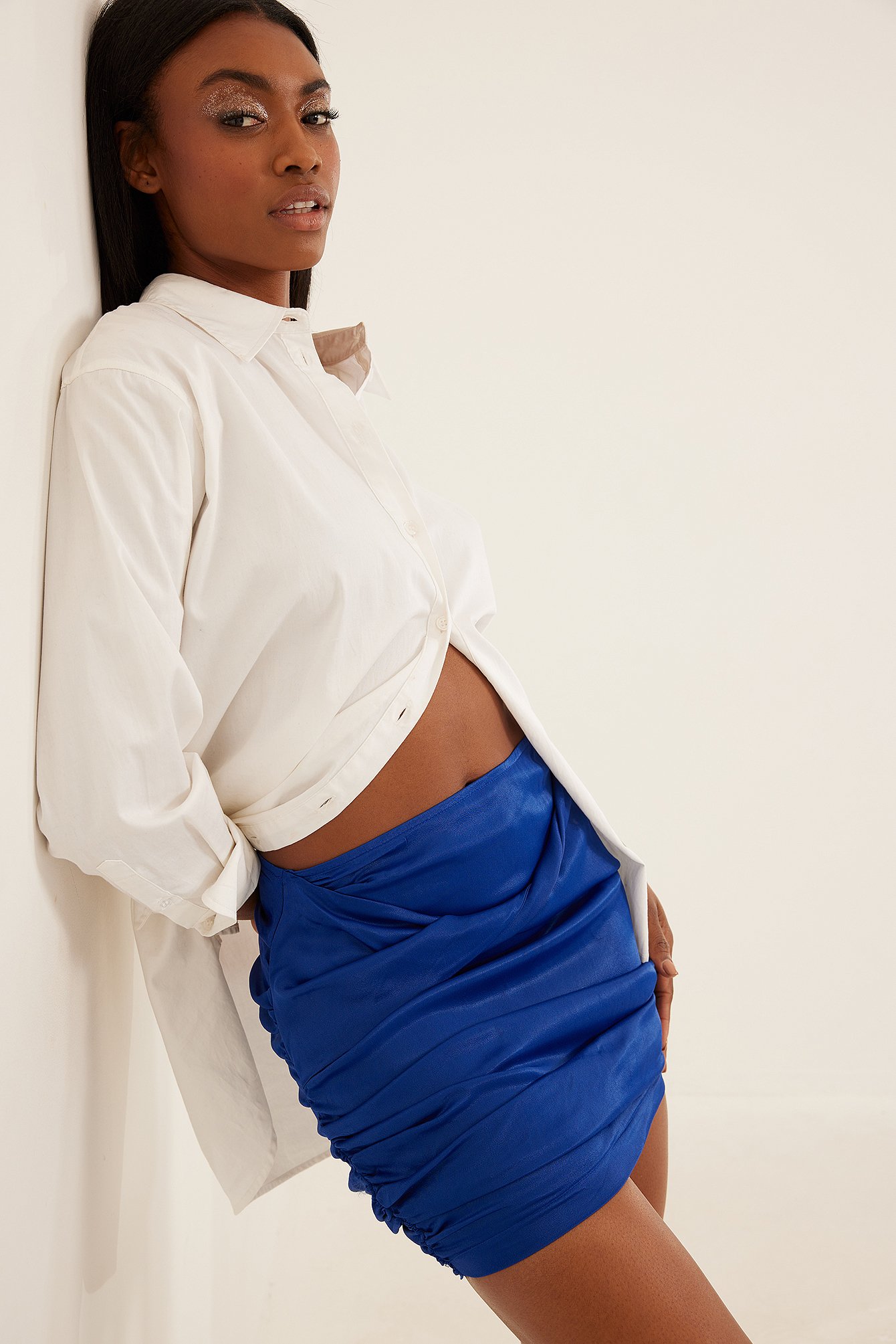Blue Mini rok met gedrapeerde voorkant