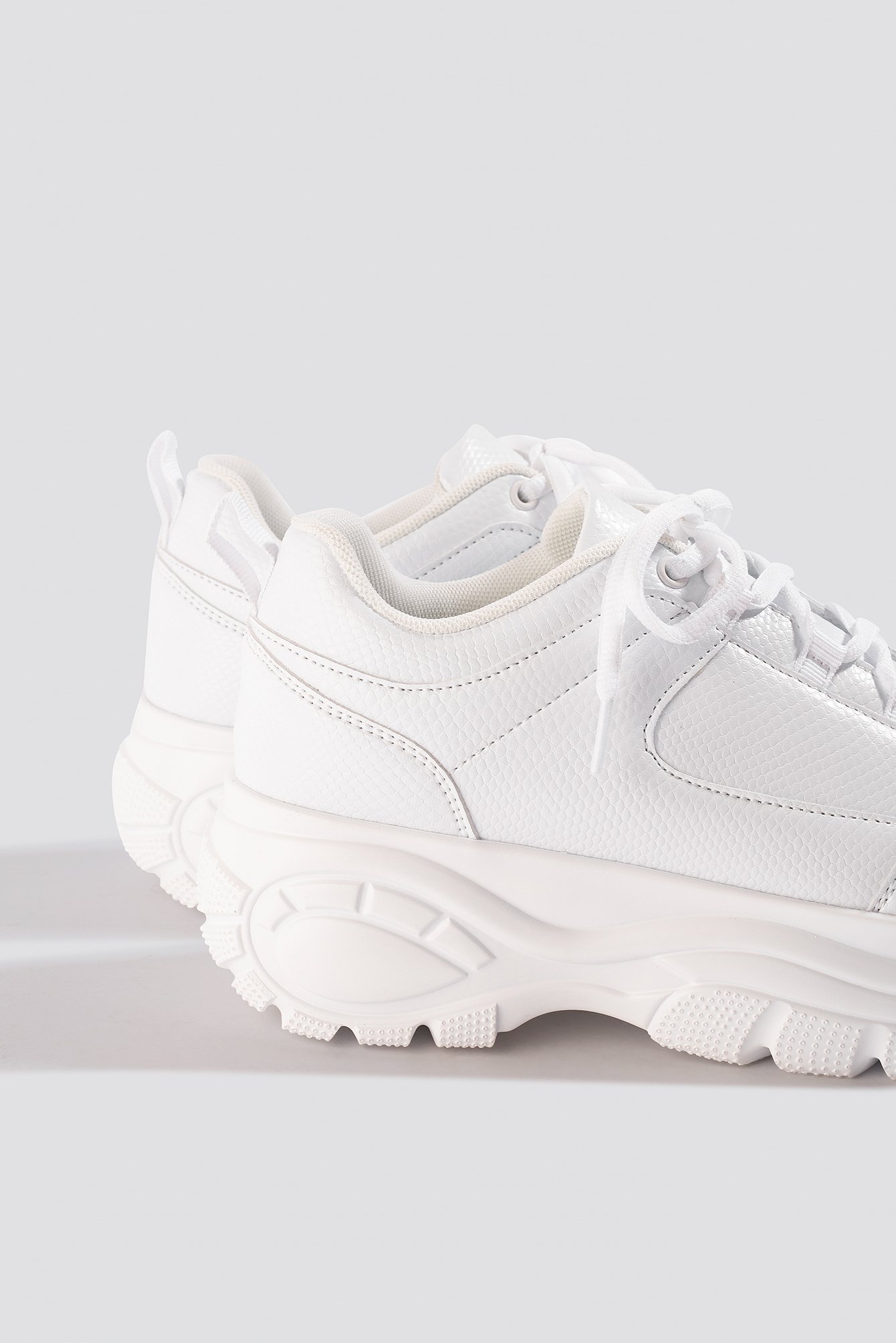 chunky white platform trainers