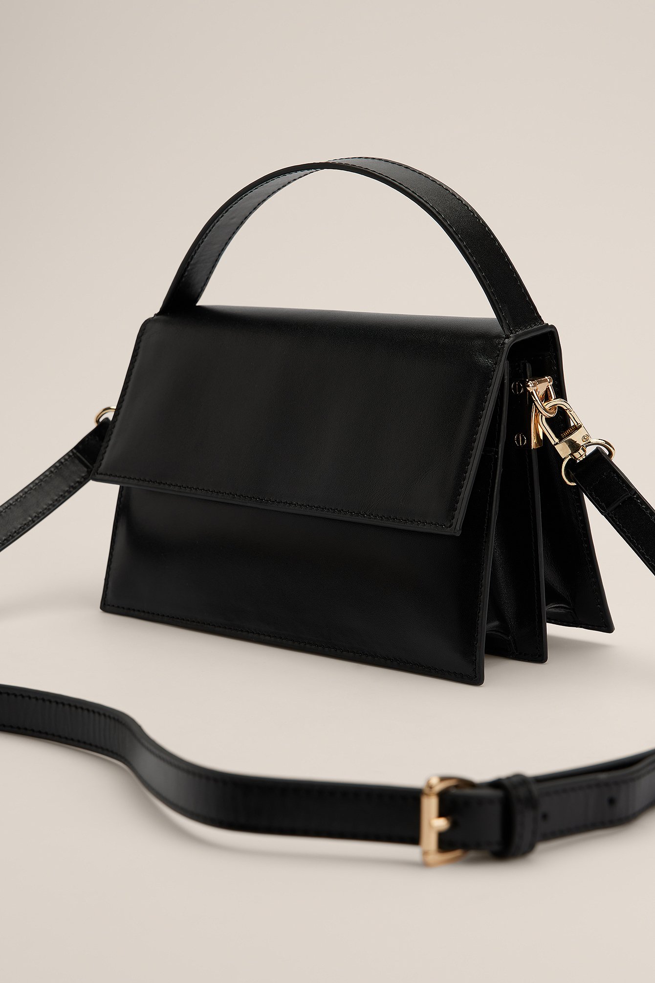 Black Ruminddelt lædertaske med klap