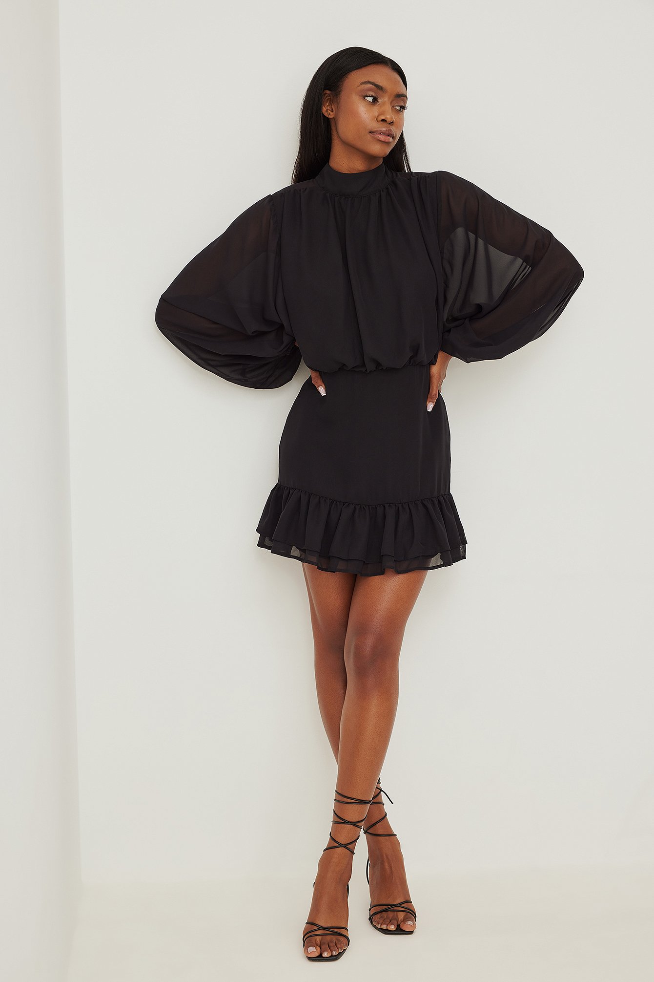 Black Doorzichtige mini-jurk met hoge halslijn