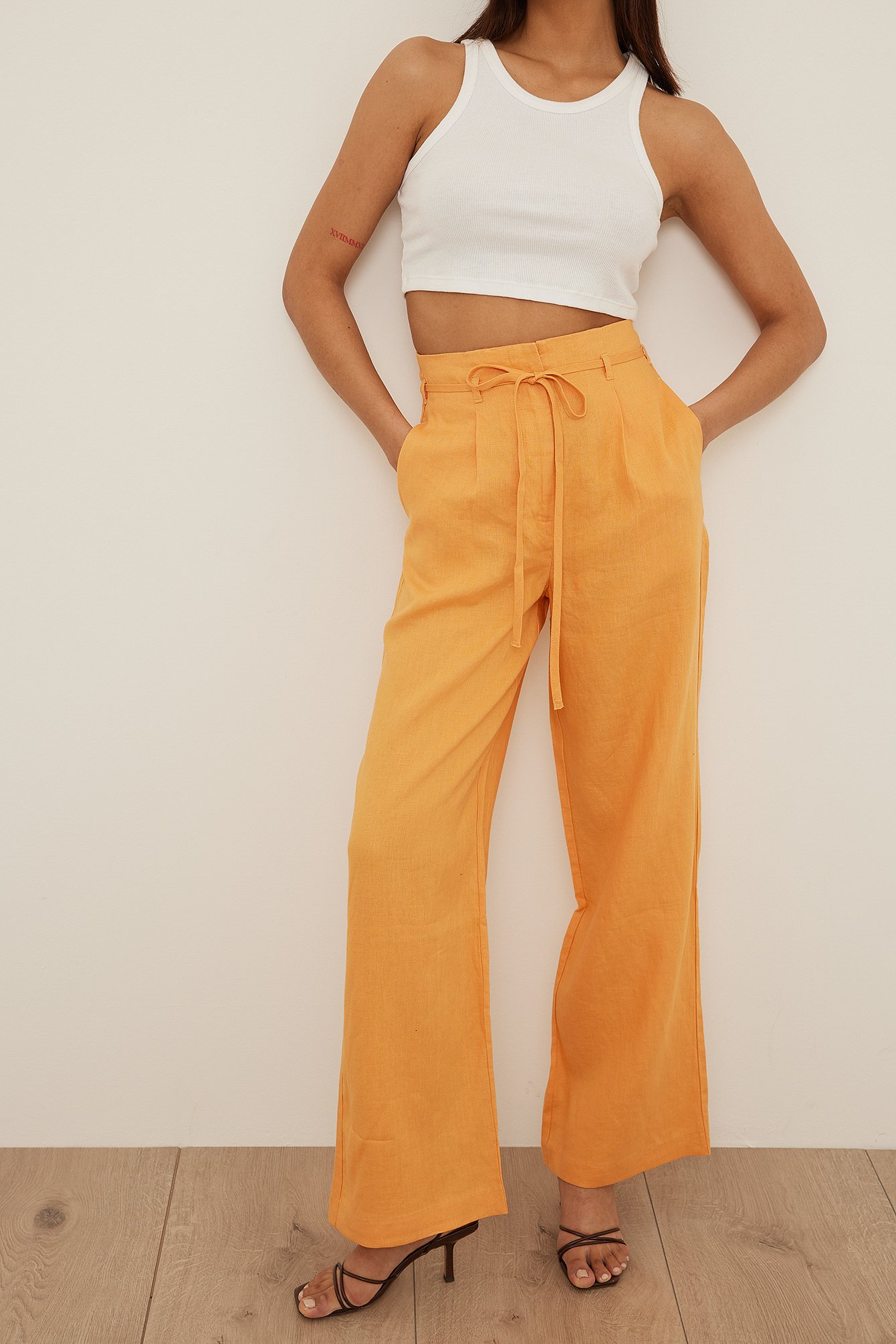 Orange Pantaloni in lino a vita alta