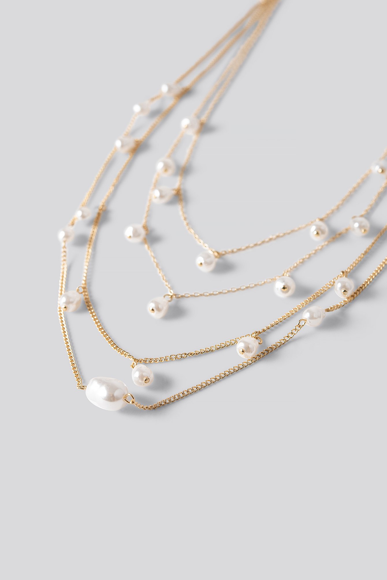 Gold Layered Uneven Pearl Necklace