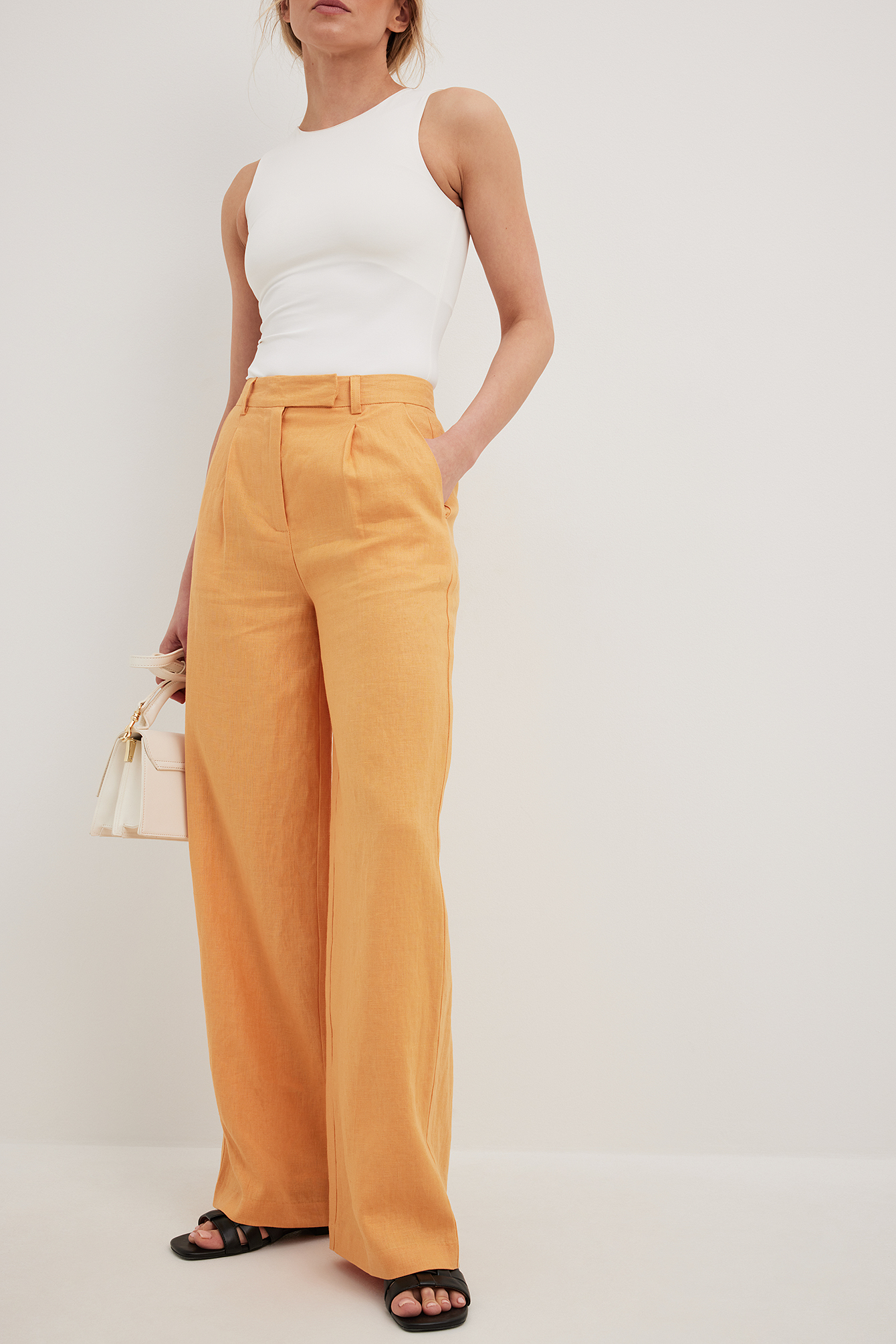 Wide-leg mid-rise trousers with orange zig-zag detailing - Compania  Fantastica