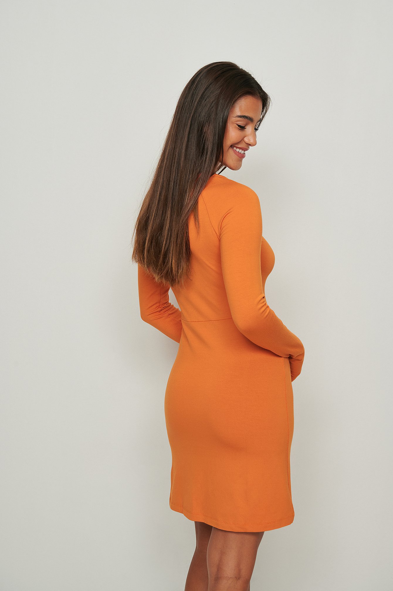 Orange Jersey mini-jurk met detail op de hals