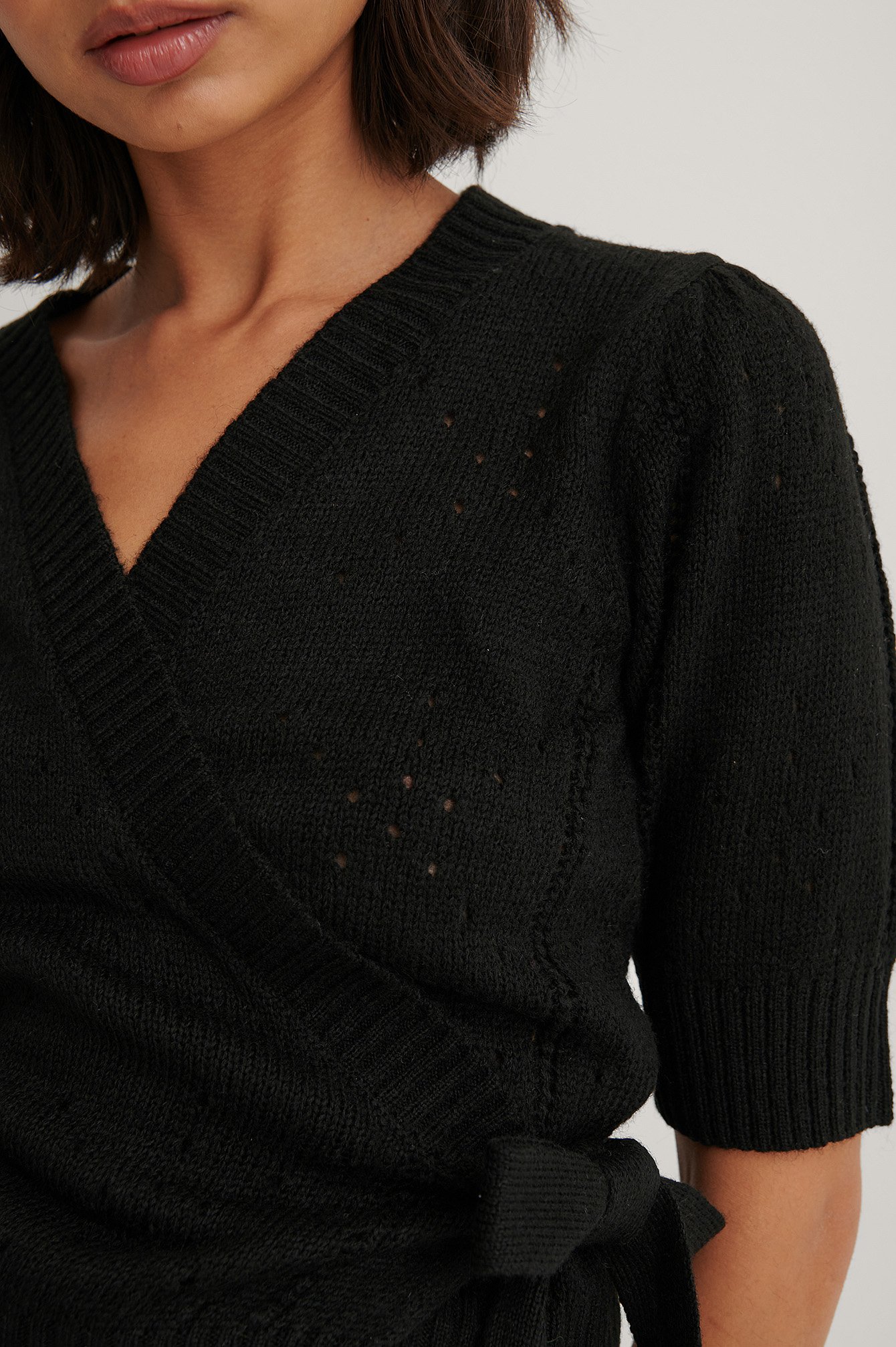 Black Overlap Pattern Knitted Sweater