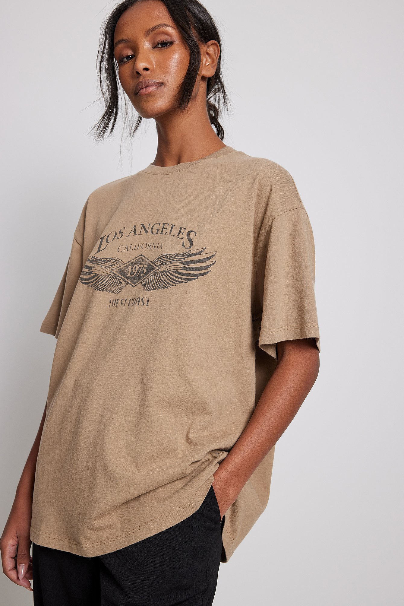 Beige T-shirt i overstørrelse med Los Angeles-print