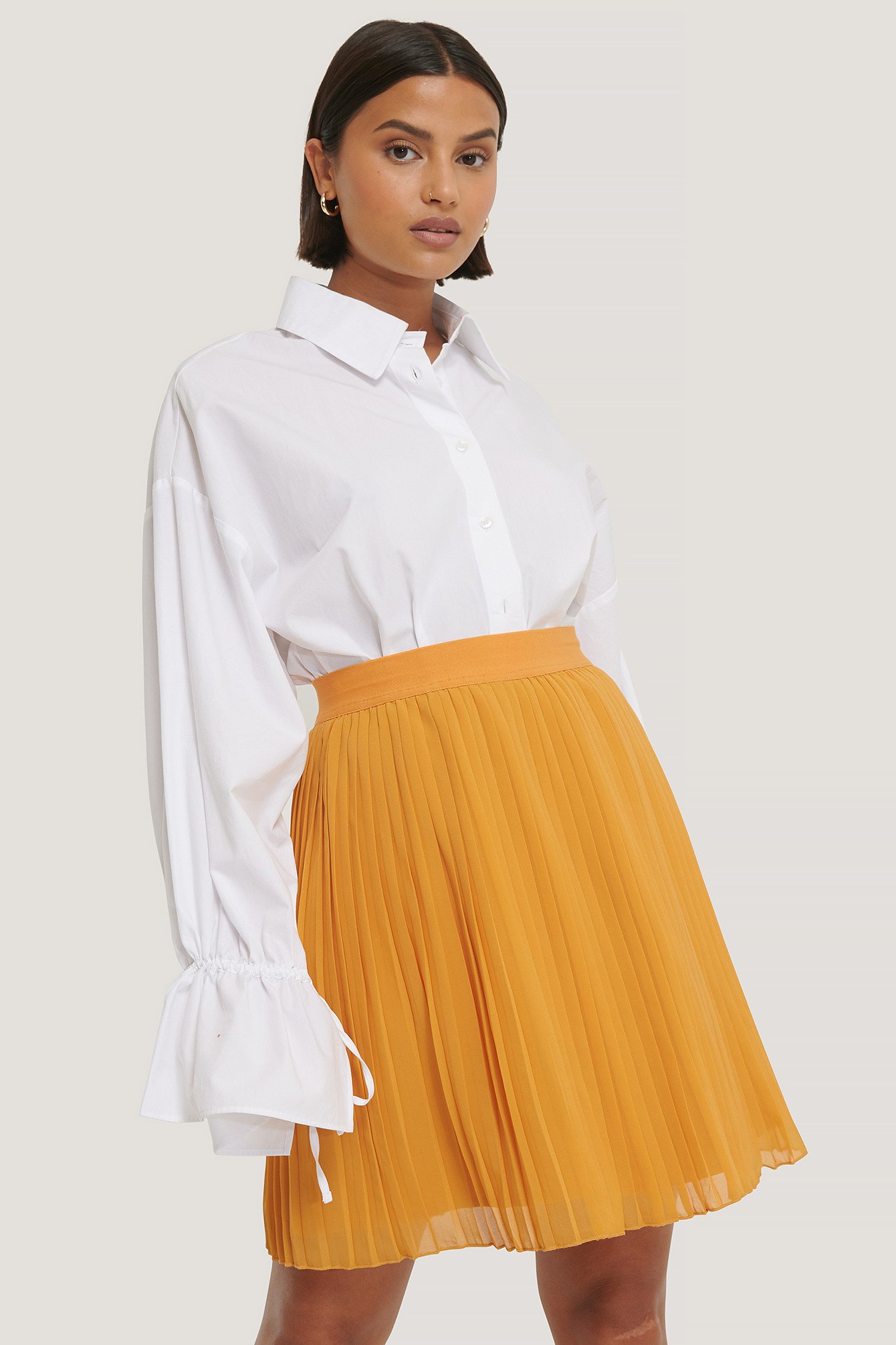 Yellow Pleated Mini Skirt