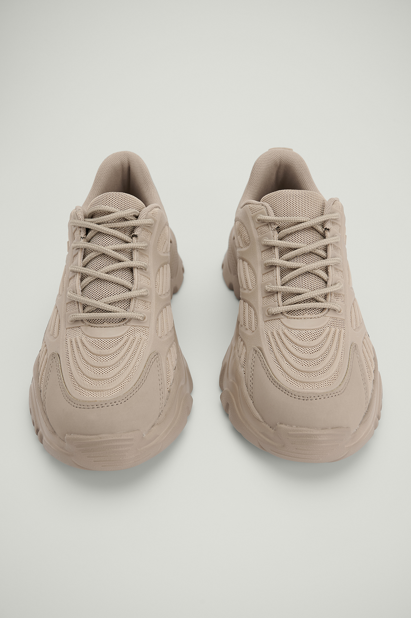 beige chunky trainers