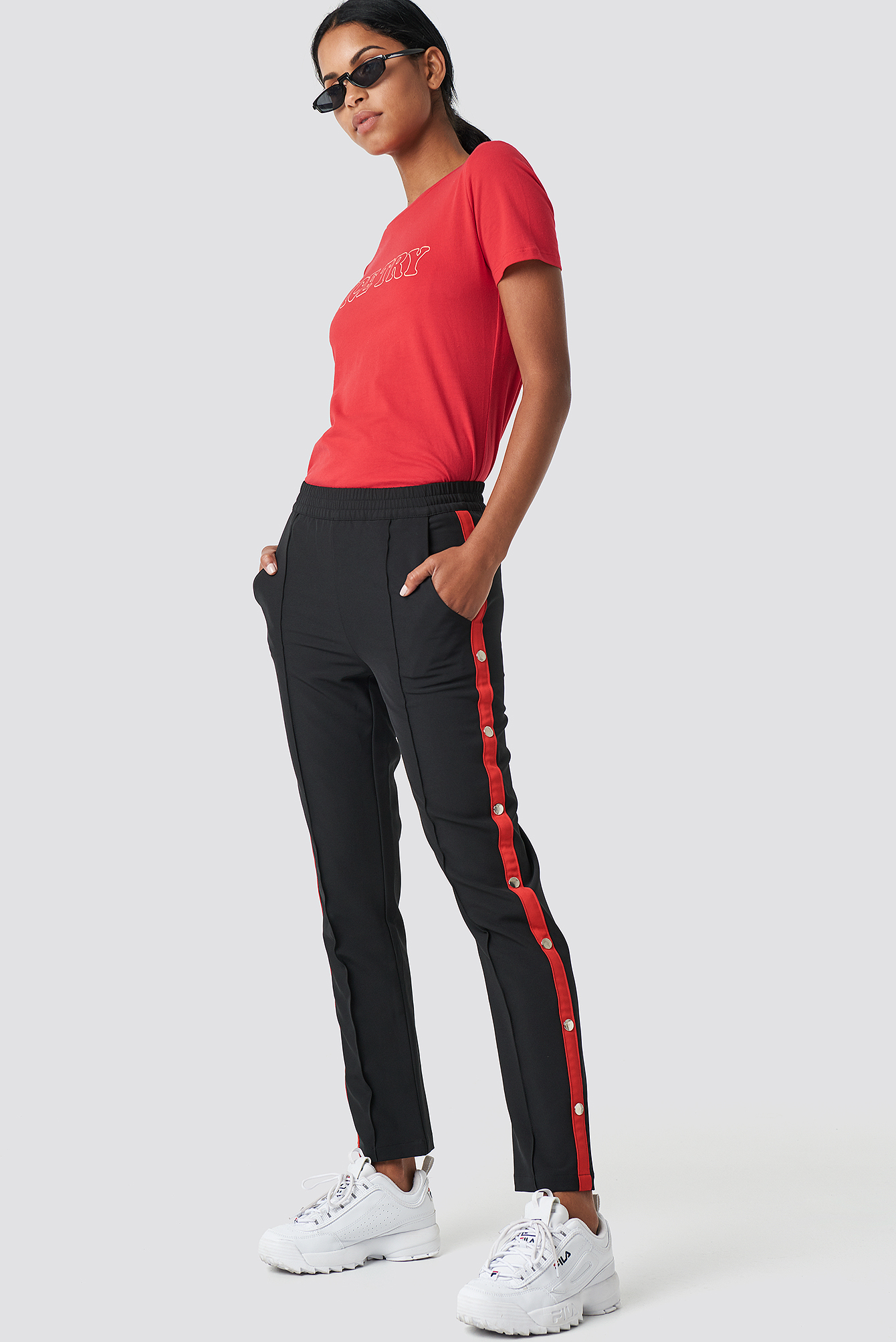 Popper side tracksuit bottoms with side stripes 