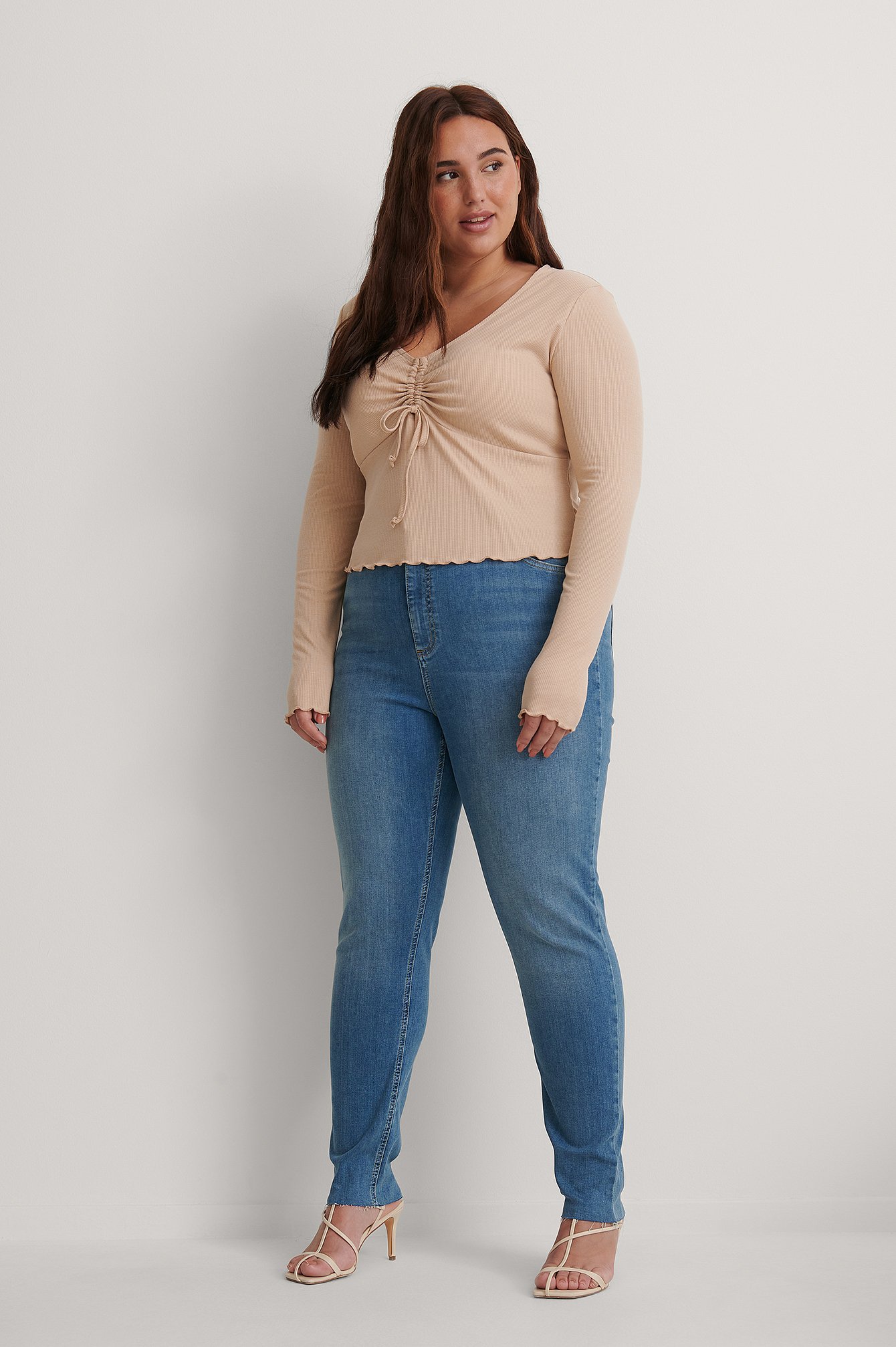 Mid Blue Økologiske skinny højtaljede jeans med rå hem