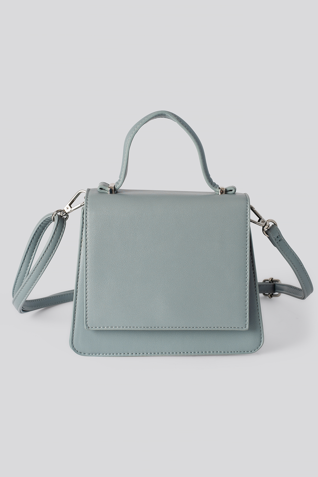 Top Handle Mini Trapeze Bag Stone Blue